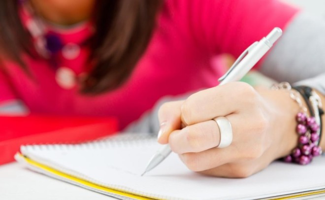 woman-writing-in-notebook